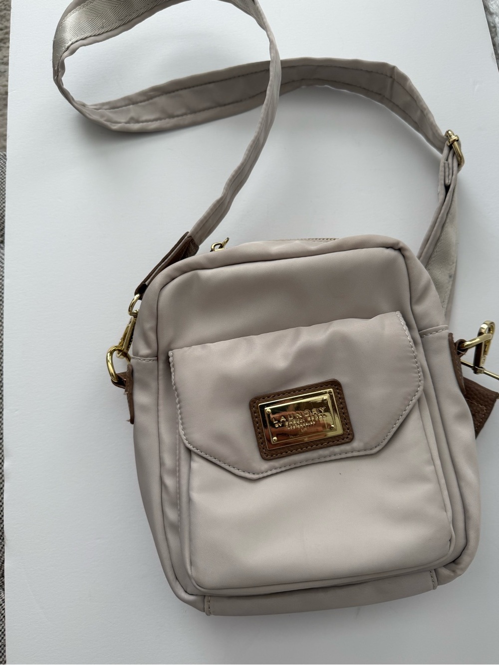 NWOT Light Beige Laundry Crossbody Bag with Gold Accent
